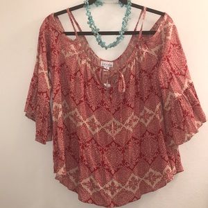 Red and cream cold shoulder top